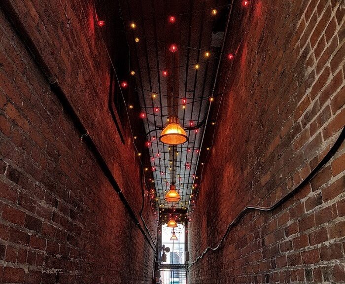 Light Installation - Red and Warm White Super-Bright Globe Lights In Alley Commercial Christmas