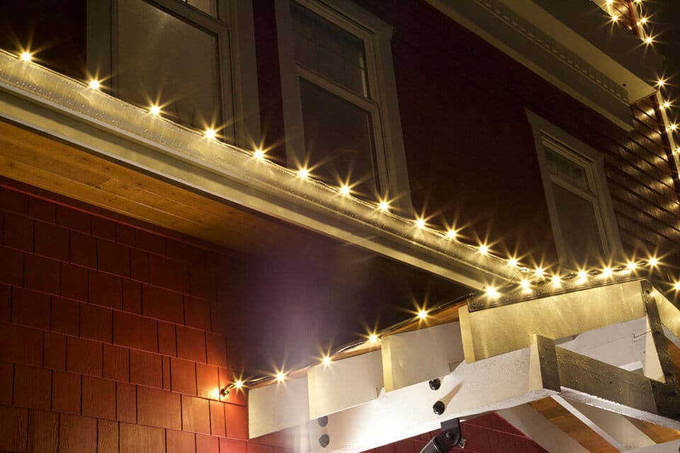 Residential Christmas Lighting Installation - Warm White Super-bright Globe Lights on Roofline